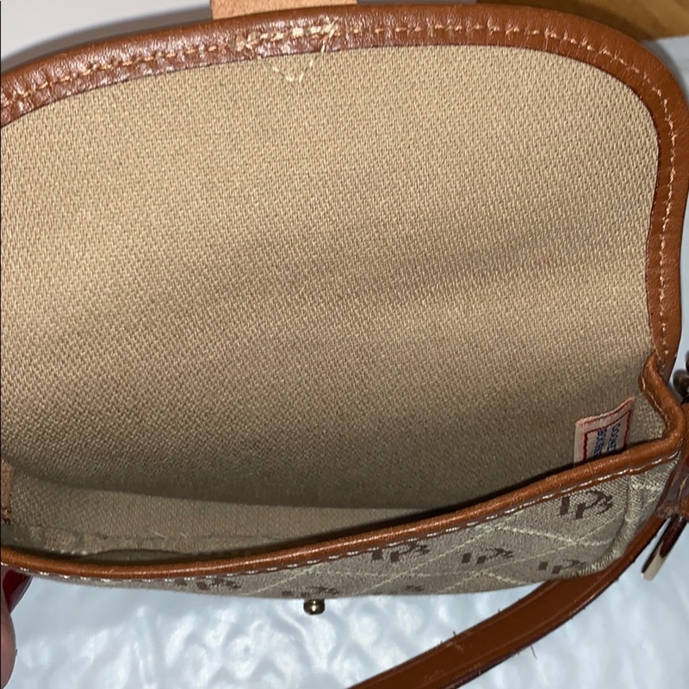Dooney & Bourke tan & brown button flap wristlet - Picture 7 of 8